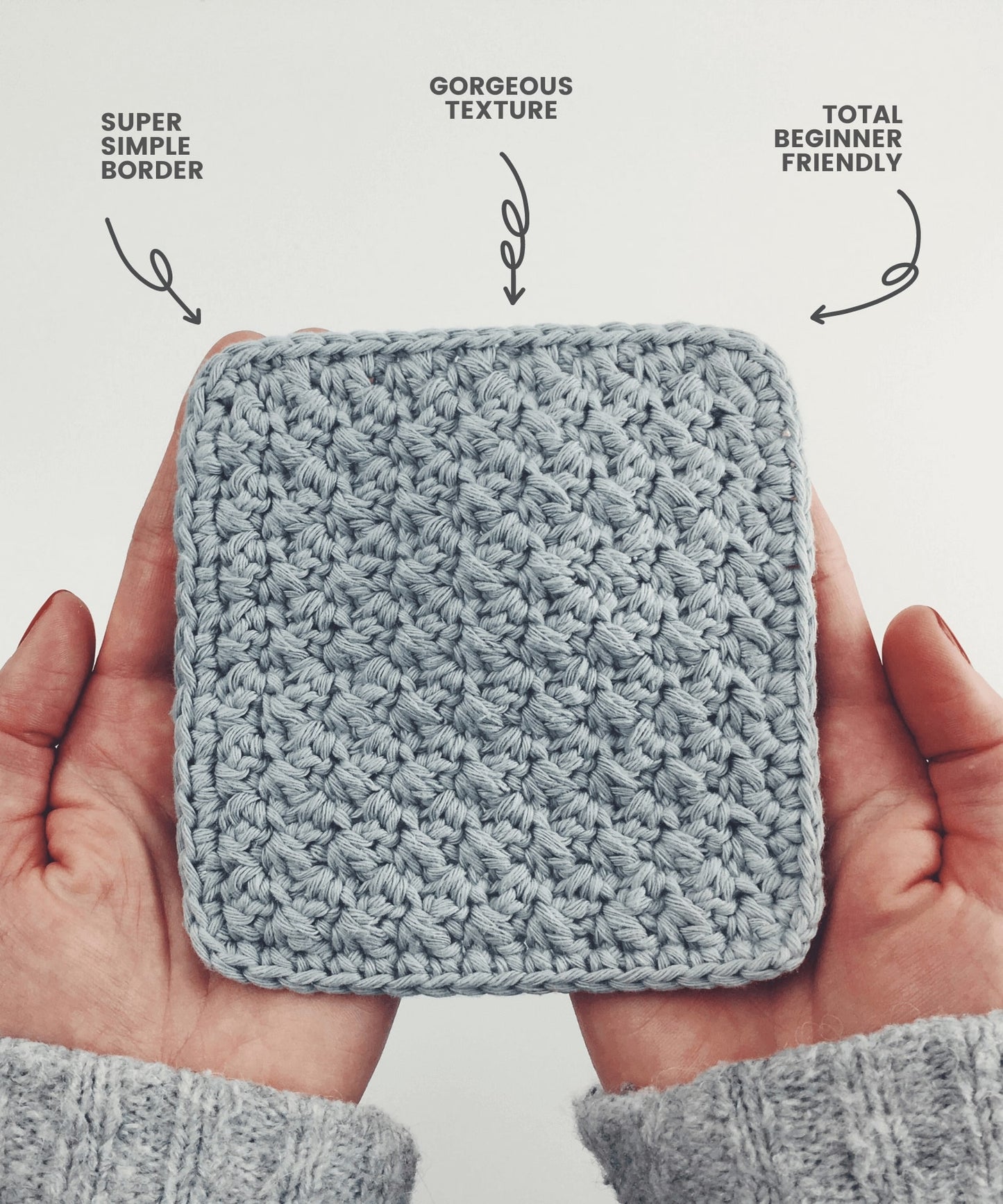Square grey crochet coaster being held. Text and arrows point to the coaster reading: Super Simple Border, Gorgeous texture, Total beginner friendly.